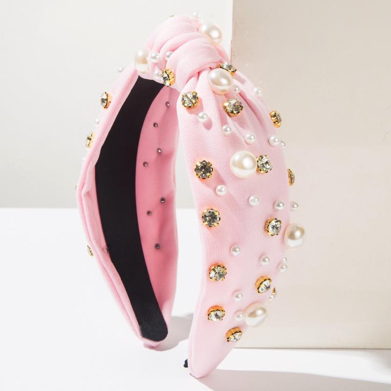 Wide-edge Hairband with Pearl-topped Knots - An Elegant Hair Accessory for Holding Your Hair in Place. світло-рожевий колір
Wide-edge Hairband with Pearl-topped Knots - An Elegant Hair Accessory for Holding Your Hair in Place. світло-рожевий колір