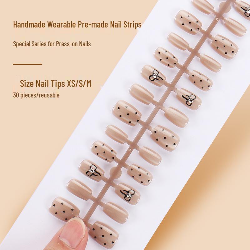 Douyin Trendy Cat Eye Wearable Nails: High-End, Polka Dot, Bowknot, Retro Style False Nail Strips.
Douyin Trendy Cat Eye Wearable Nails: High-End, Polka Dot, Bowknot, Retro Style False Nail Strips.