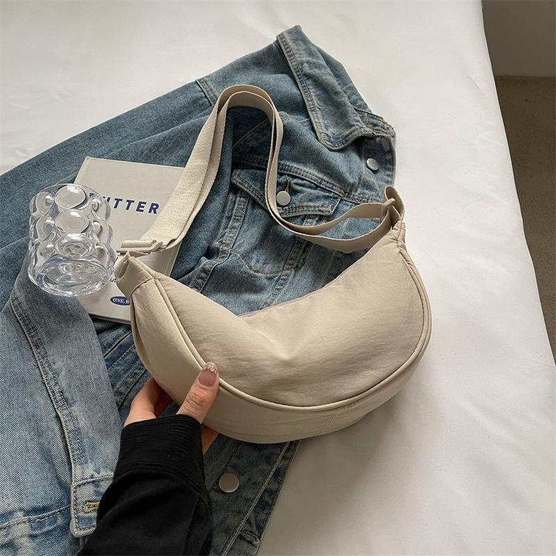 Youjia fitting room female messenger bag Xiaohongshu nylon dumpling bag student shoulder bag cloth bag supply No specification сірий колір
Youjia fitting room female messenger bag Xiaohongshu nylon dumpling bag student shoulder bag cloth bag supply No specification сірий колір