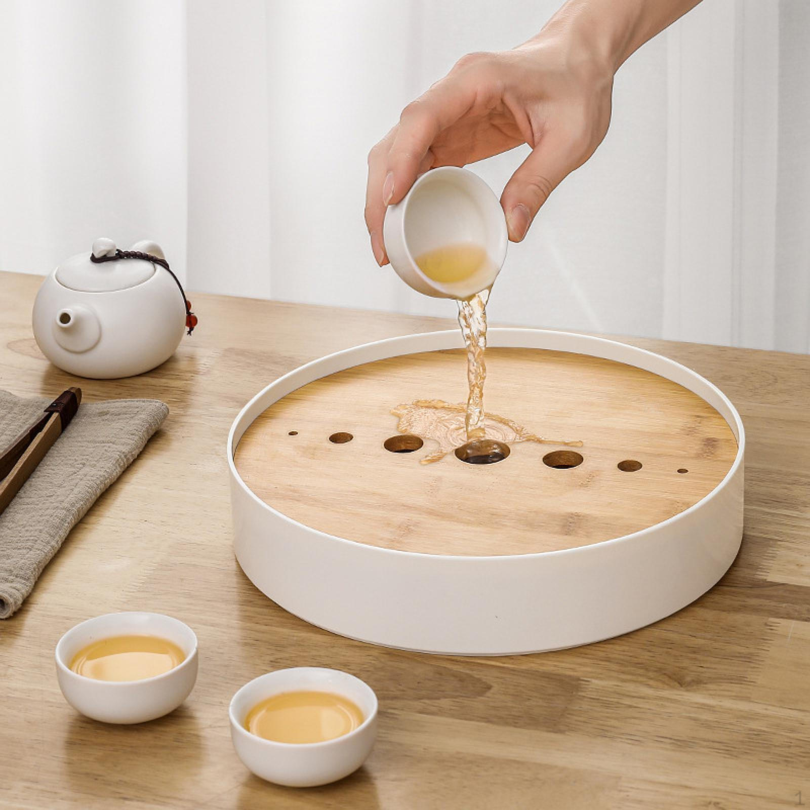 Гонфу чайна церемонія лотка бамбука зливного кунгфу подає для бару білий
Гонфу чайна церемонія лотка бамбука зливного кунгфу подає для бару білий