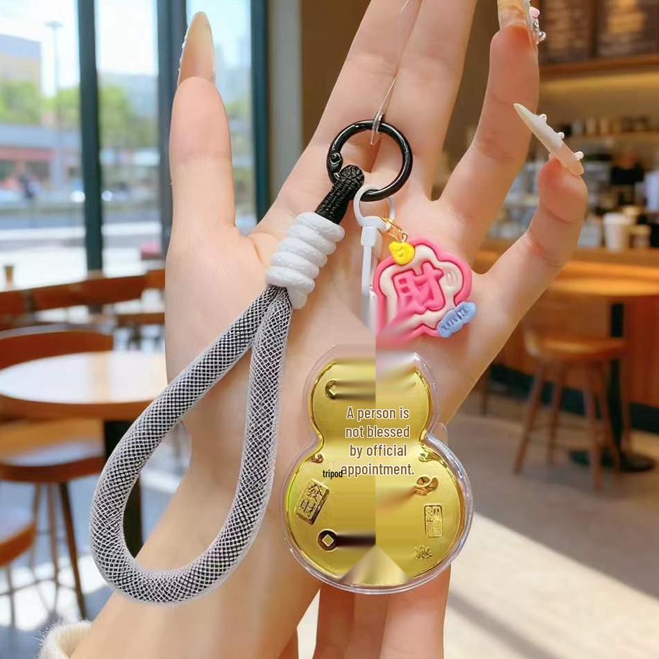Gold-Plated Gourd Keychain with Water Bead in Tian Guan Ci Fu Style
Gold-Plated Gourd Keychain with Water Bead in Tian Guan Ci Fu Style