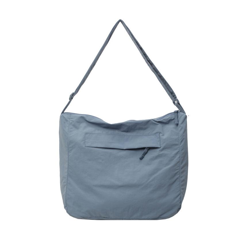 Japanese solid color nylon bag shoulder large bag female student class messenger bag waterproof lightweight large capacity fitness bag рожевий
Japanese solid color nylon bag shoulder large bag female student class messenger bag waterproof lightweight large capacity fitness bag рожевий