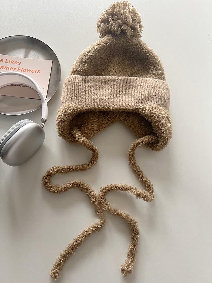 Cute braid hairball ear protection knitted hat warm thickened wool hat female trend Adult (56-58cm) хакі
Cute braid hairball ear protection knitted hat warm thickened wool hat female trend Adult (56-58cm) хакі