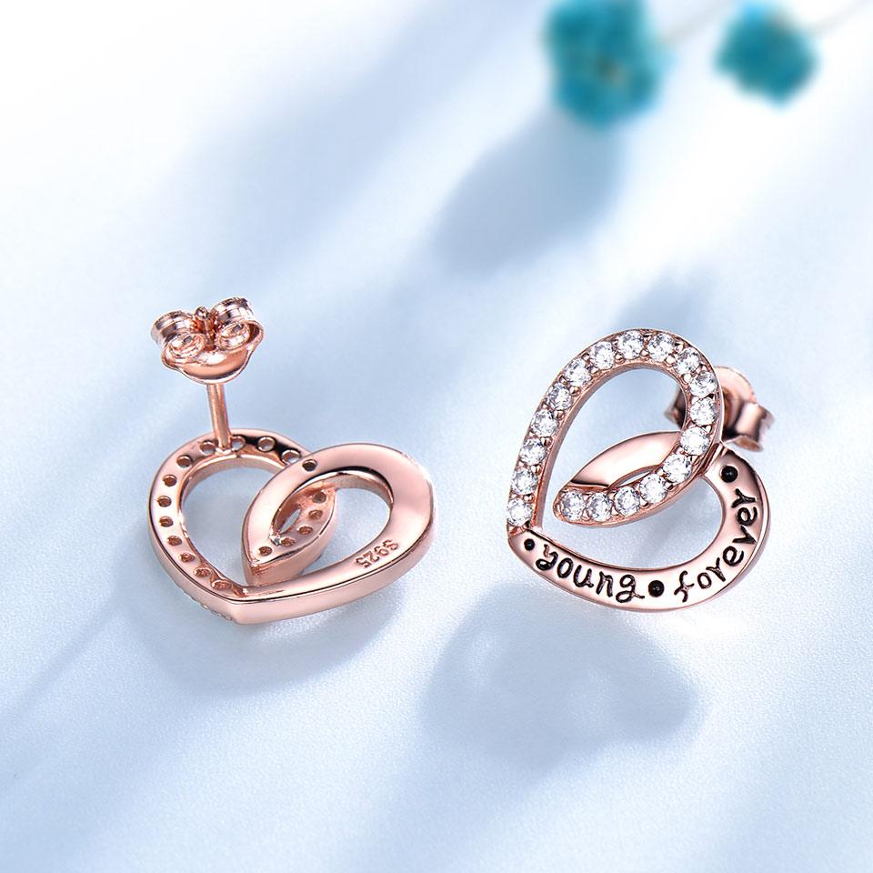 Серьги-пусеты в форме переплетенных сердец, покрытые розовым золотом, минималистичные украшения для женщин розового золота
Серьги-пусеты в форме переплетенных сердец, покрытые розовым золотом, минималистичные украшения для женщин розового золота