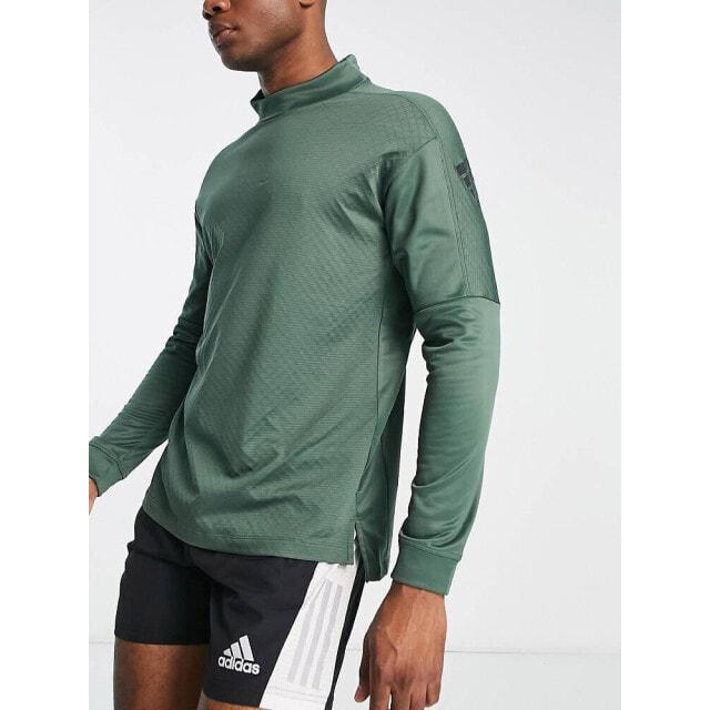 Зеленая теплая футболка с воротником-стойкой и длинными рукавами adidas Training Strength
Зеленая теплая футболка с воротником-стойкой и длинными рукавами adidas Training Strength