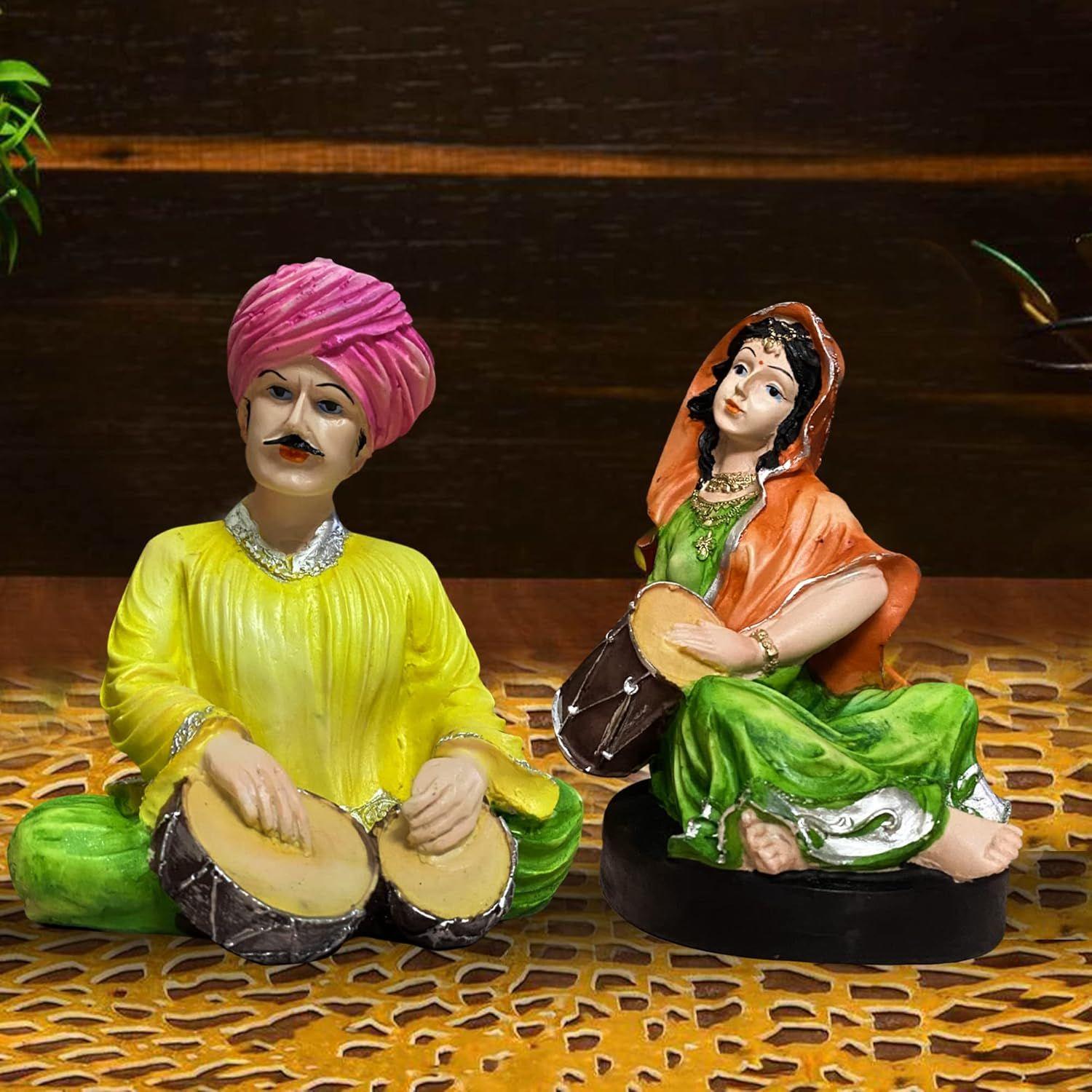 Rajasthani Traditional Musical Couple Resin Statues for Home Decor (Pack of 2, Multicolor)
Rajasthani Traditional Musical Couple Resin Statues for Home Decor (Pack of 2, Multicolor)