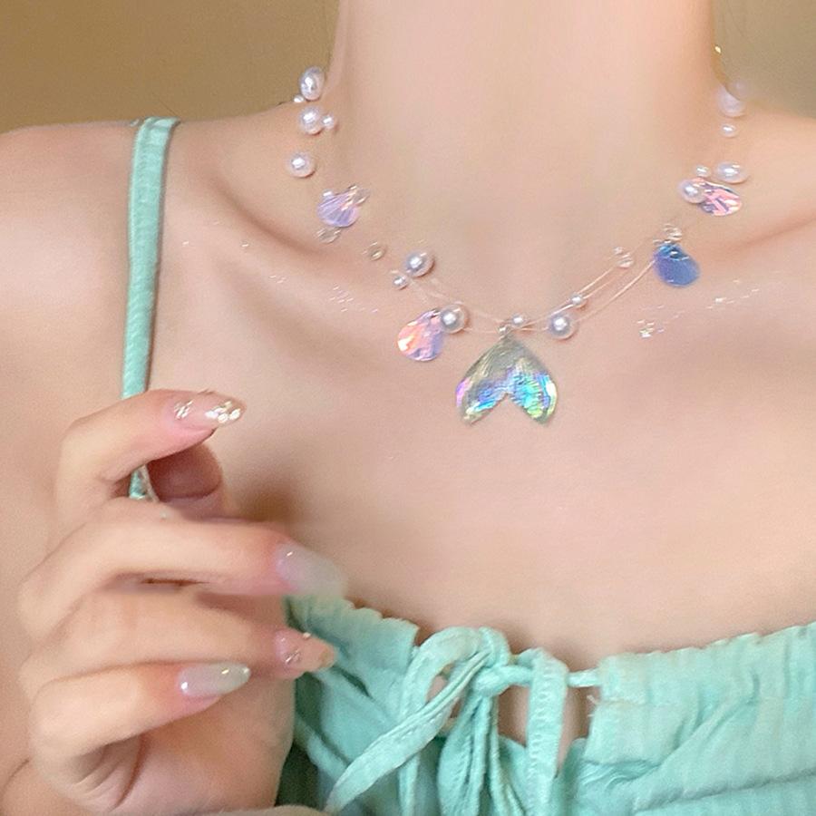 Pearl glass shell fishtail pendant necklace fashionable exquisite small fresh collarbone chain leisure vacation style necklace women
Pearl glass shell fishtail pendant necklace fashionable exquisite small fresh collarbone chain leisure vacation style necklace women