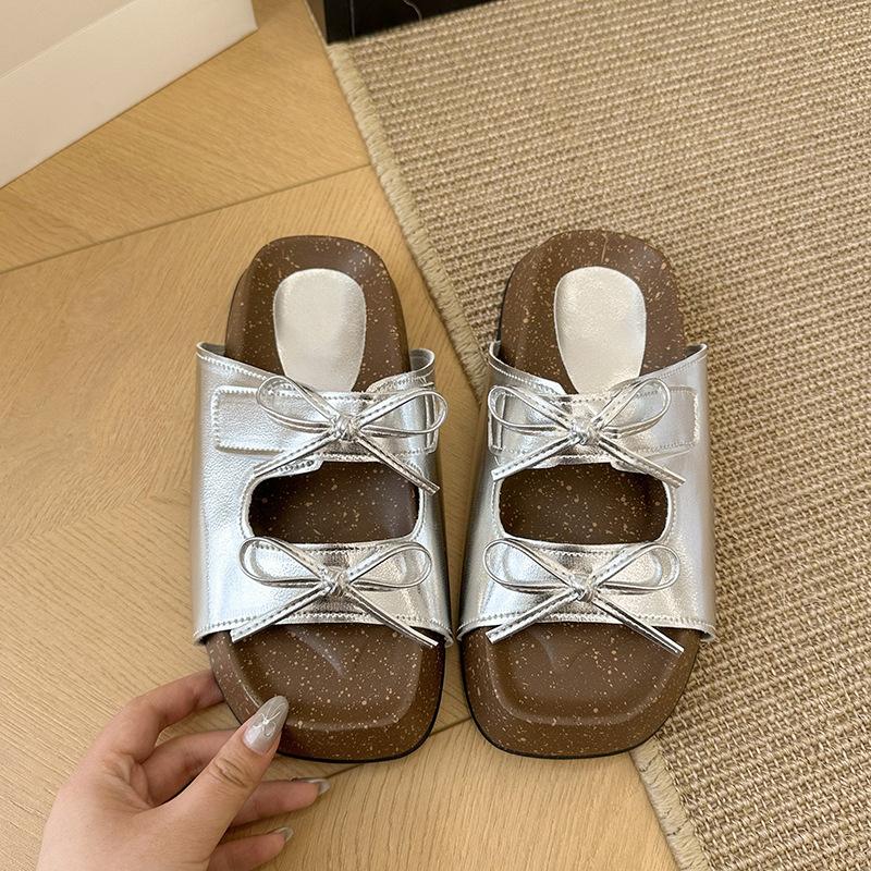 Double bow suede one-word drag outer wear summer new soft bottom versatile seaside Boken sandals 40 серебряный
Double bow suede one-word drag outer wear summer new soft bottom versatile seaside Boken sandals 40 серебряный