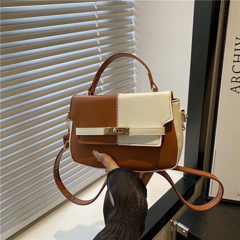 Summer new product splicing contrasting color texture niche design sense high temperament simple shoulder crossbody handbag коричневий
Summer new product splicing contrasting color texture niche design sense high temperament simple shoulder crossbody handbag коричневий
