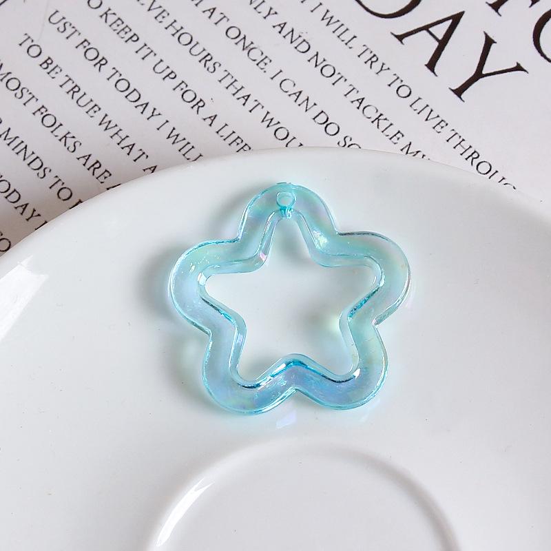Luminous Iridescent Star Charms: Transparent Acrylic with Glitter Pentagram Design
Luminous Iridescent Star Charms: Transparent Acrylic with Glitter Pentagram Design