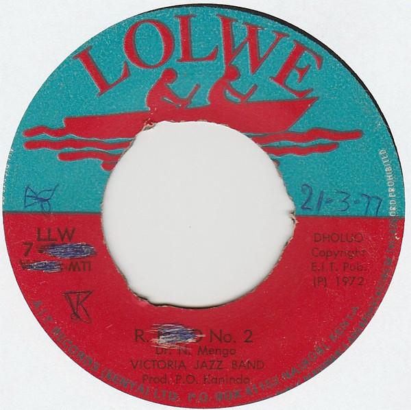 7inch Record VICTORIA JAZZ BAND R. Bolo No. 2 Dhano Winyo LLW71052 LOLWE 1972 Kenya World Music Used
7inch Record VICTORIA JAZZ BAND R. Bolo No. 2 Dhano Winyo LLW71052 LOLWE 1972 Kenya World Music Used