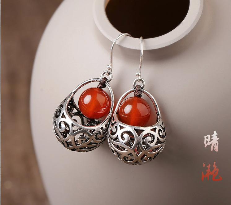 GEMCHIC Women s Vintage Ethnic Style Silver Basket Earrings with Red Agate Beads, Handcrafted Hollow Carved Drop Earrings for Cheongsam and Daily Wear
GEMCHIC Women s Vintage Ethnic Style Silver Basket Earrings with Red Agate Beads, Handcrafted Hollow Carved Drop Earrings for Cheongsam and Daily Wear