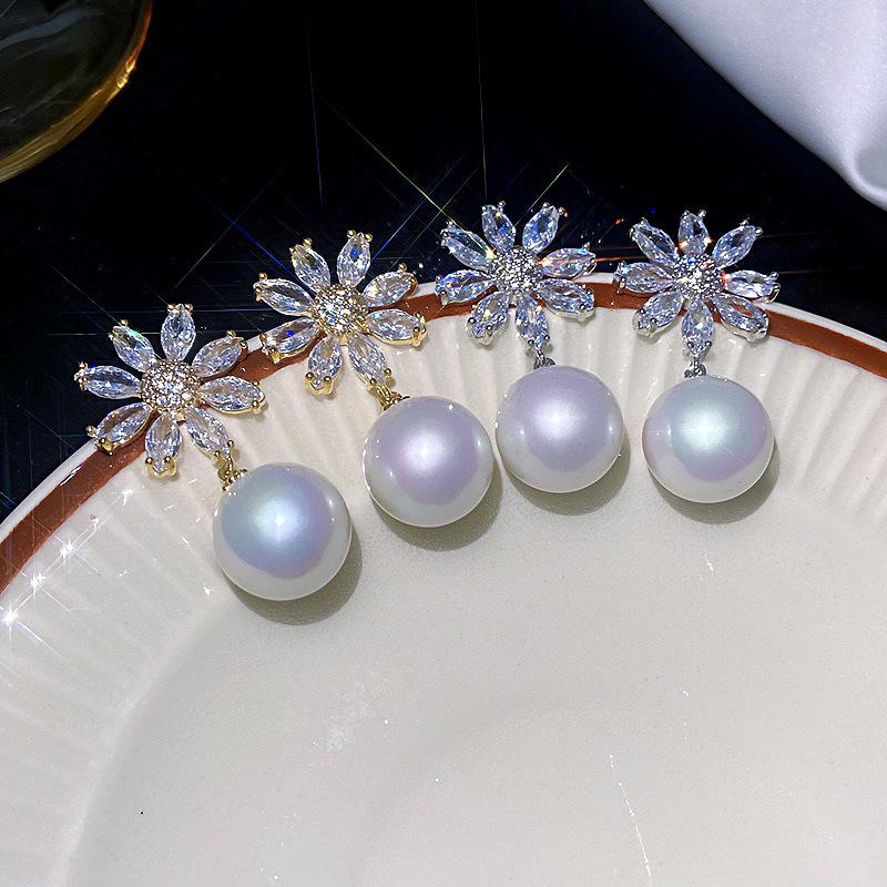 Versatile High-End Copper Zircon Sunflower Pearl Earrings - Women s Fashion Studs
Versatile High-End Copper Zircon Sunflower Pearl Earrings - Women s Fashion Studs
