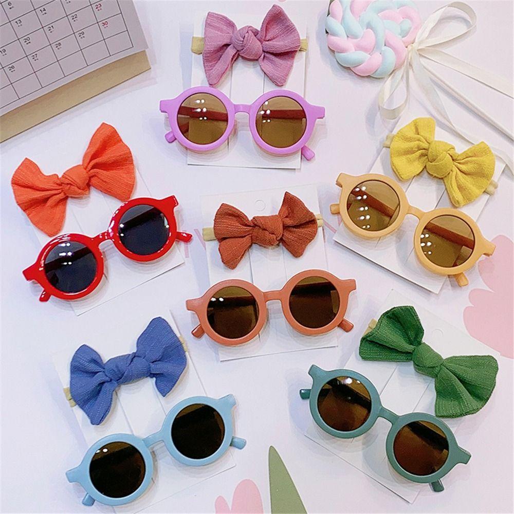2Pcs/Set Round Frame Kids Sunglasses with Bow Headband Colorful Hairbands for Baby Girls
2Pcs/Set Round Frame Kids Sunglasses with Bow Headband Colorful Hairbands for Baby Girls