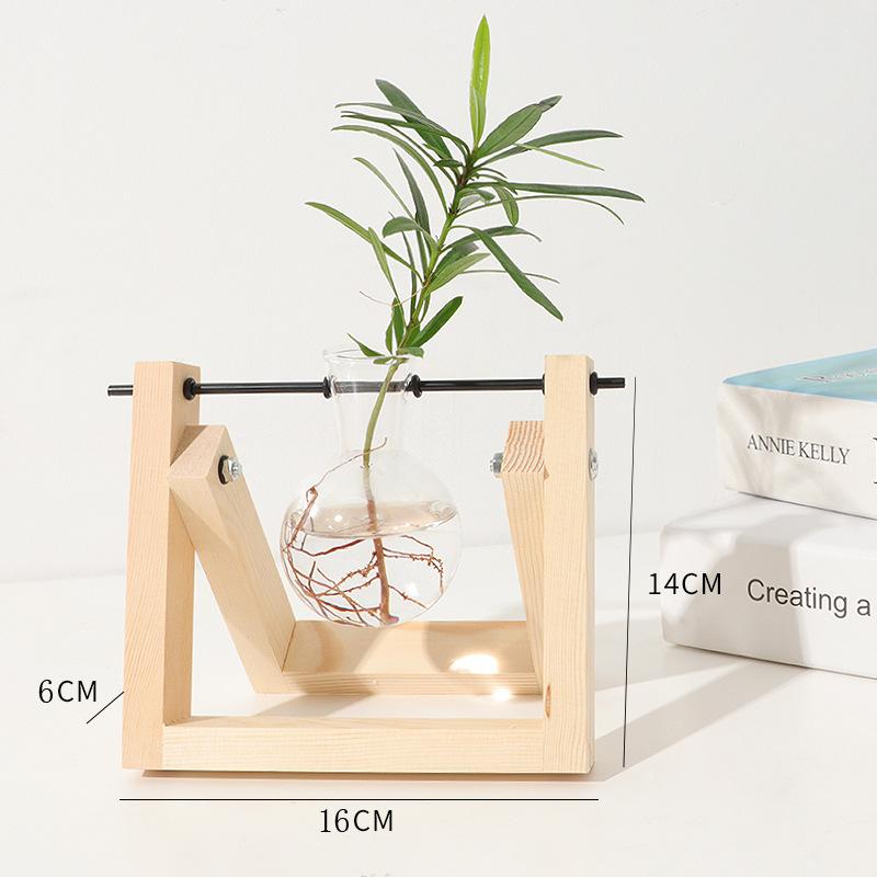 Hydroponic plant glass vase with wooden stand, simple desktop home decoration, green plant cultivation container
Hydroponic plant glass vase with wooden stand, simple desktop home decoration, green plant cultivation container
