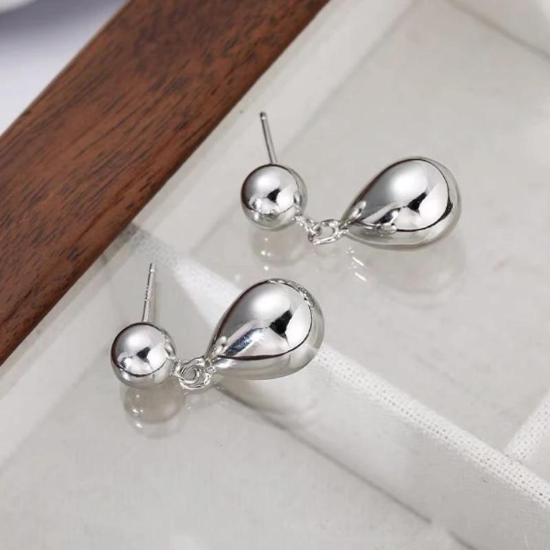 ANENJERY Glossy Needle Water Drop Stud Earrings for Women Waterproof Personality Design Earrings Party Jewelry Accessories
ANENJERY Glossy Needle Water Drop Stud Earrings for Women Waterproof Personality Design Earrings Party Jewelry Accessories