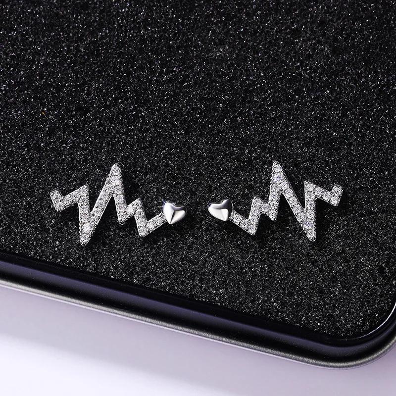 Ne w Delicate Heartbeat Shaped Stud Earrings Female with Dazzling CZ Simple Stylish Women Accessories Versatile Zircon 2025
Ne w Delicate Heartbeat Shaped Stud Earrings Female with Dazzling CZ Simple Stylish Women Accessories Versatile Zircon 2025