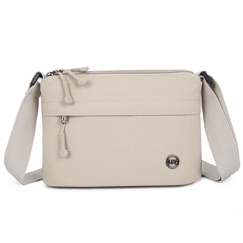 Нейлонова багатосекційна жіноча сумка кросбоді через плече - Універсальна та трендова для поїздок на роботу білий
Нейлонова багатосекційна жіноча сумка кросбоді через плече - Універсальна та трендова для поїздок на роботу білий