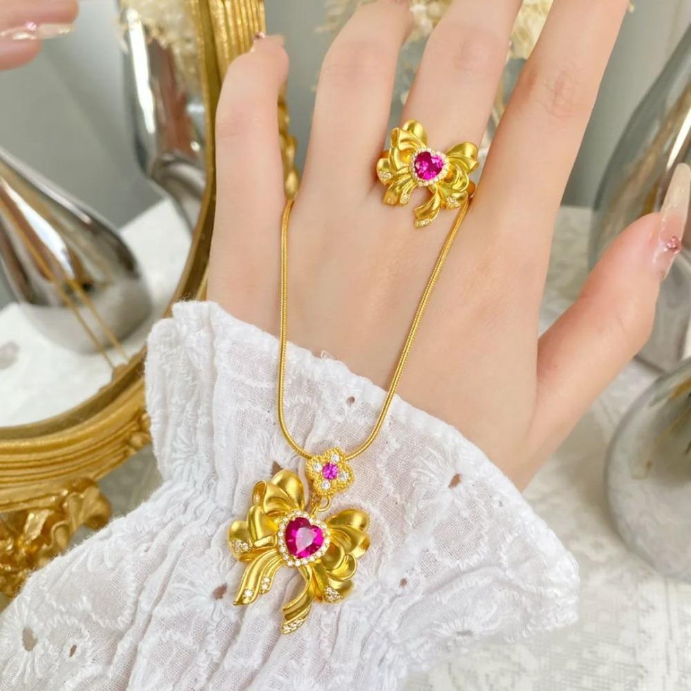 Vintage Gold Plated Sailor Moon Jewelry Set Heart Bow Necklace Red Garnet Ring for Women
Vintage Gold Plated Sailor Moon Jewelry Set Heart Bow Necklace Red Garnet Ring for Women