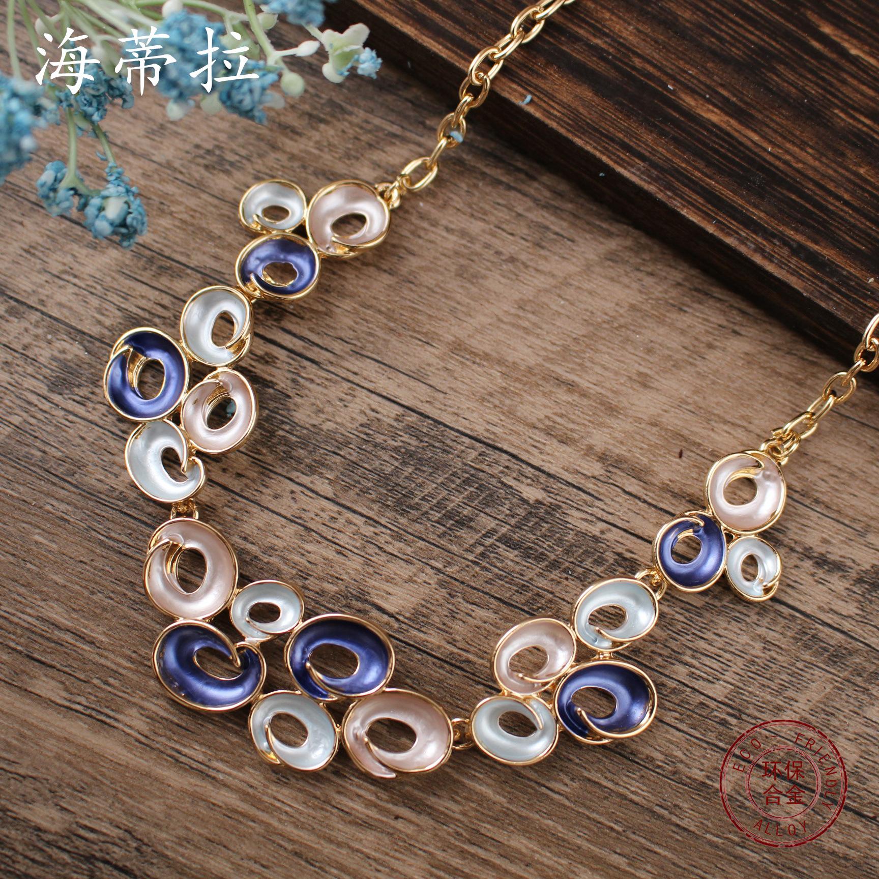 New color painting oil geometric hollow round flower necklace, fashionable and high-end women s versatile neck chain
New color painting oil geometric hollow round flower necklace, fashionable and high-end women s versatile neck chain