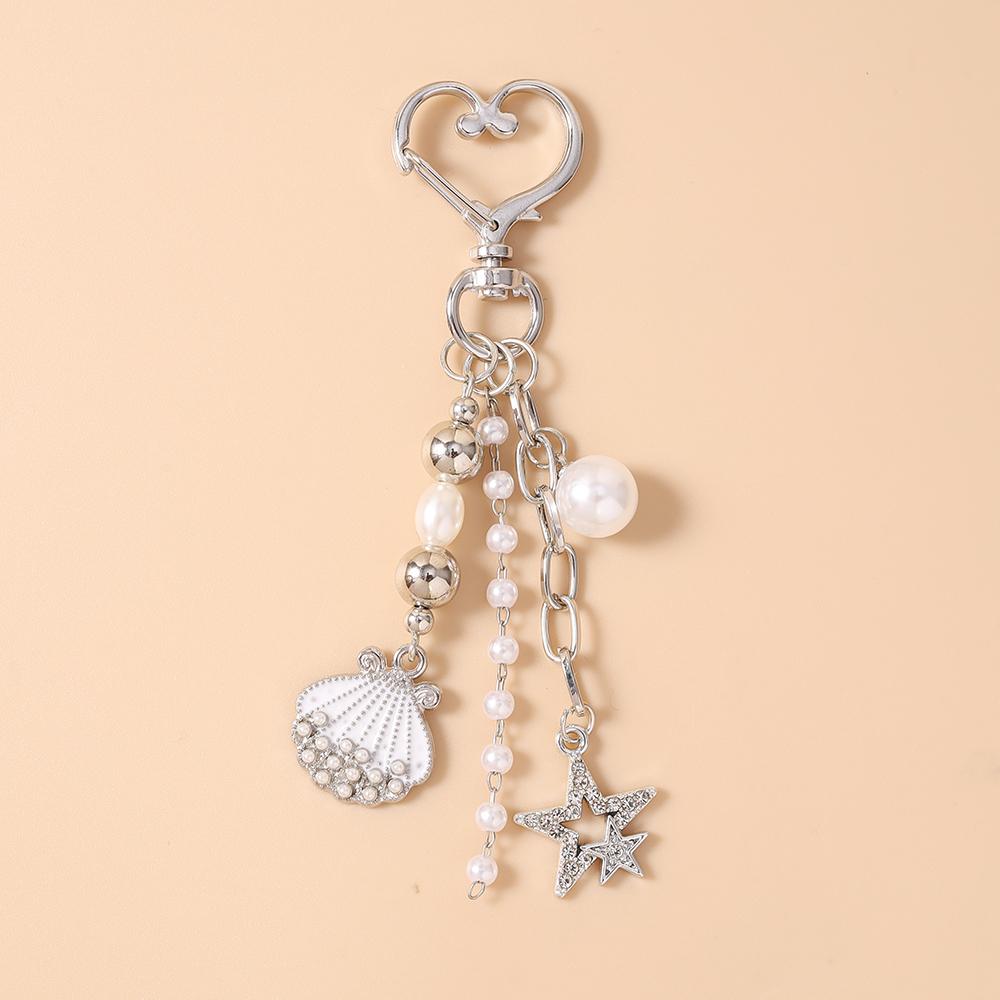 Pretty Crystal Star Shell Star Keychain Pearl Beads Key Ring Pendant for Women Girls Handbag Decor DIY Key Chain Jewelry Gifts
Pretty Crystal Star Shell Star Keychain Pearl Beads Key Ring Pendant for Women Girls Handbag Decor DIY Key Chain Jewelry Gifts
