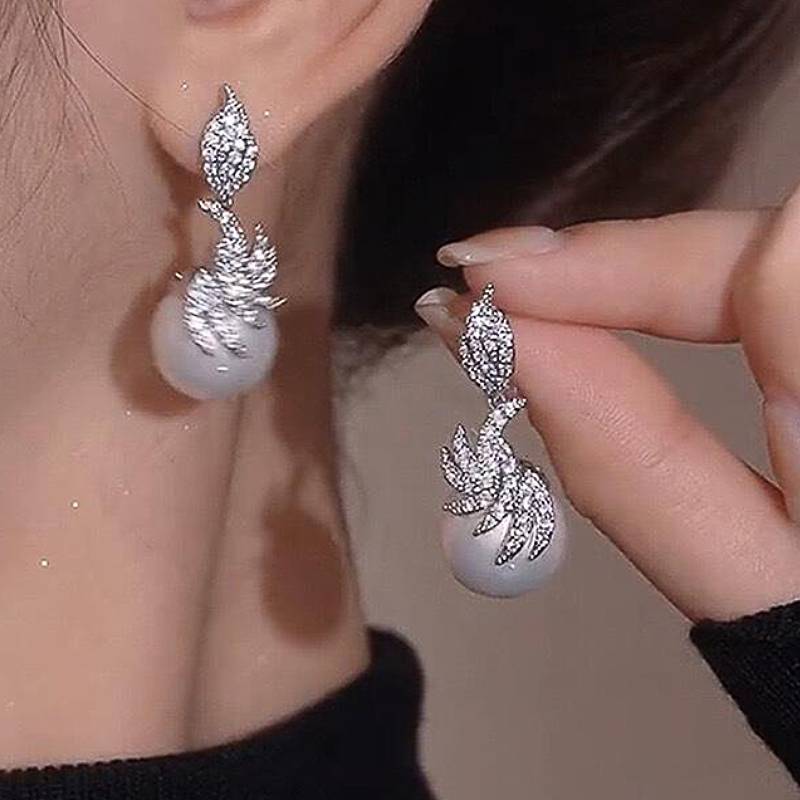Huitan Elegant Design Women Drop Earrings Imitation Pearl Luxury Wedding Anniversary Trendy Accessories Zircon Gift Inlaid CZ
Huitan Elegant Design Women Drop Earrings Imitation Pearl Luxury Wedding Anniversary Trendy Accessories Zircon Gift Inlaid CZ