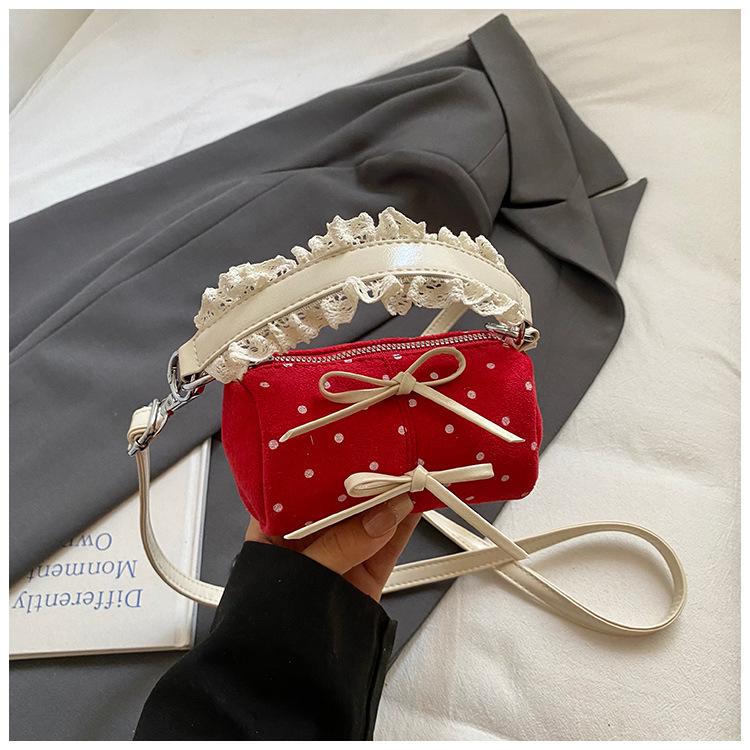 Foreign style cute bag female polka dot design cylindrical bag portable fresh and sweet niche fashion shoulder messenger bag female
Foreign style cute bag female polka dot design cylindrical bag portable fresh and sweet niche fashion shoulder messenger bag female