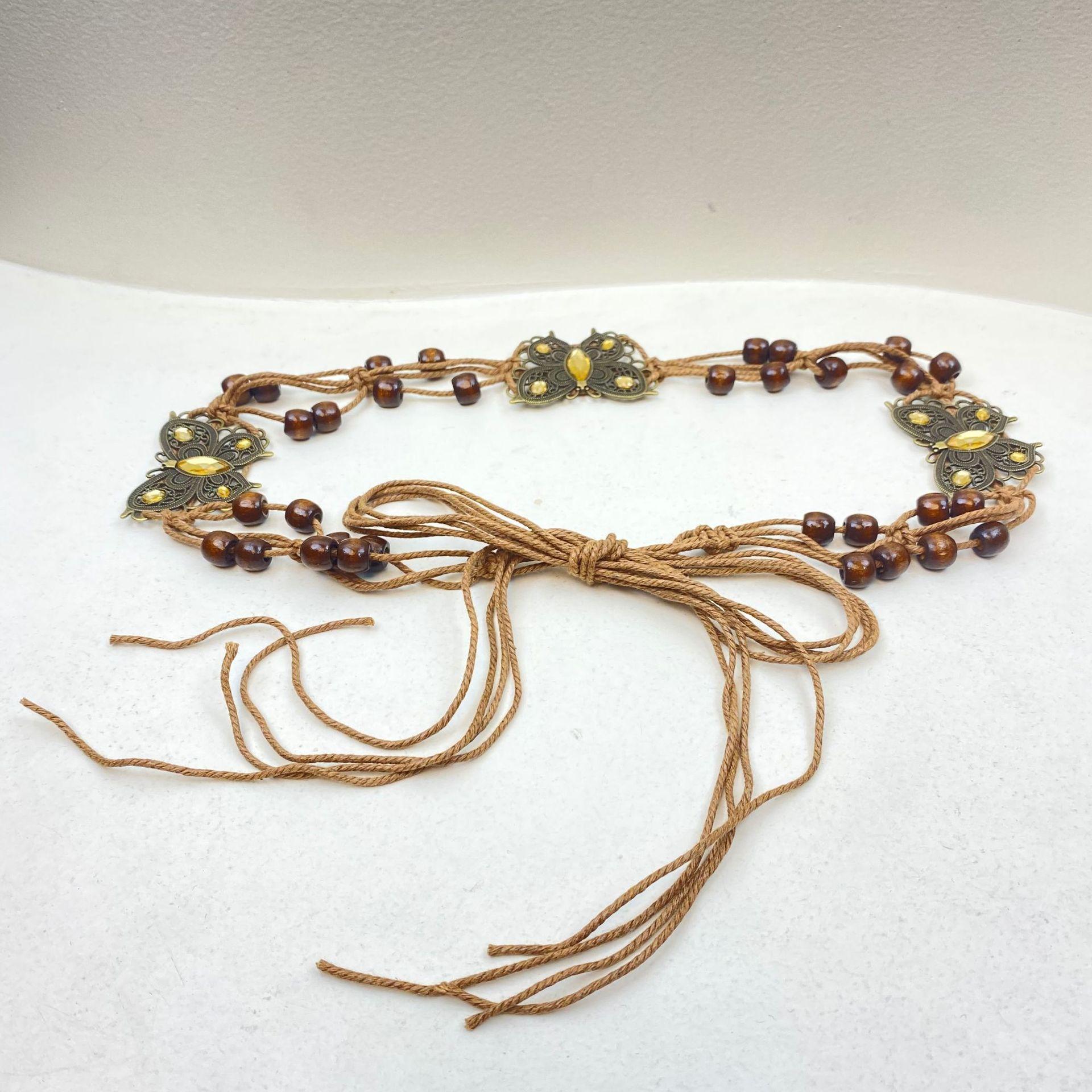 Женский пояс в богемном стиле из вощеного шнура, плетеный вручную, с узлом-бабочкой, поясная веревка для украшения платья
Женский пояс в богемном стиле из вощеного шнура, плетеный вручную, с узлом-бабочкой, поясная веревка для украшения платья