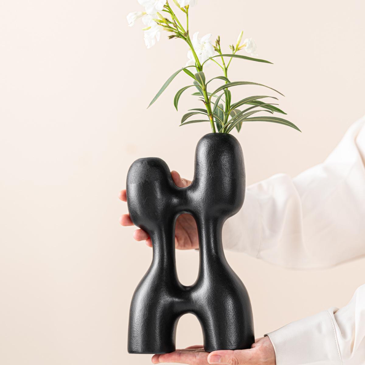 Abstract Irregular Geometry Ceramic Vase Hollow Flower Arrangement Black and White Flower Vase Terrarium Home Decoration
Abstract Irregular Geometry Ceramic Vase Hollow Flower Arrangement Black and White Flower Vase Terrarium Home Decoration