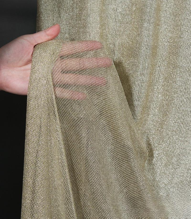 Knitted Metal Texture Fabric Elastic Metal Wire Perforated Mesh Fabric for Sewing Dresses See-through Clothing Designer Fabric 50x145cm
Knitted Metal Texture Fabric Elastic Metal Wire Perforated Mesh Fabric for Sewing Dresses See-through Clothing Designer Fabric 50x145cm