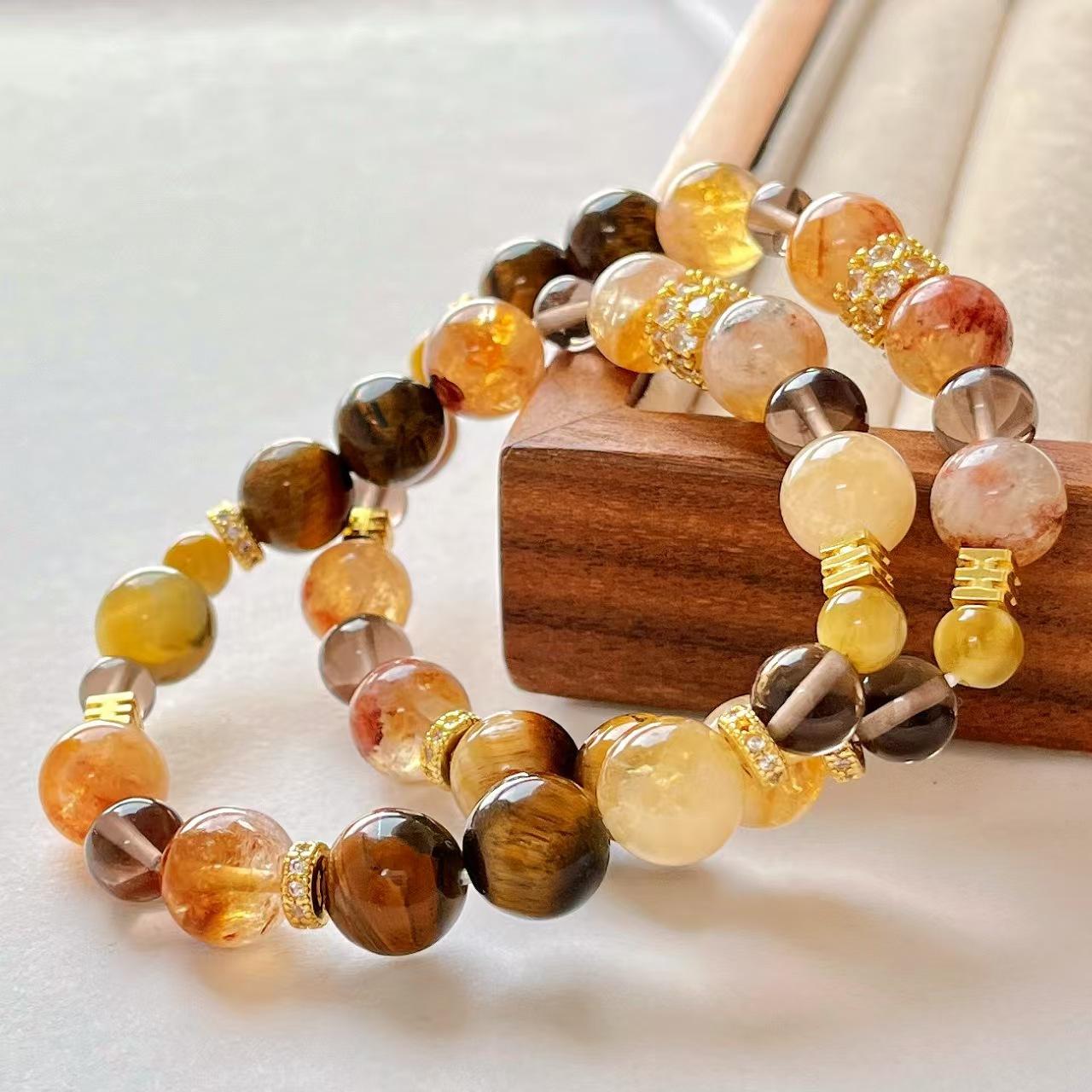 Natural Honey Milk Cover Citrine Tiger S Eye Stone Tea Crystal Contrasting Color Design Bracelet Bracelet.
Natural Honey Milk Cover Citrine Tiger S Eye Stone Tea Crystal Contrasting Color Design Bracelet Bracelet.