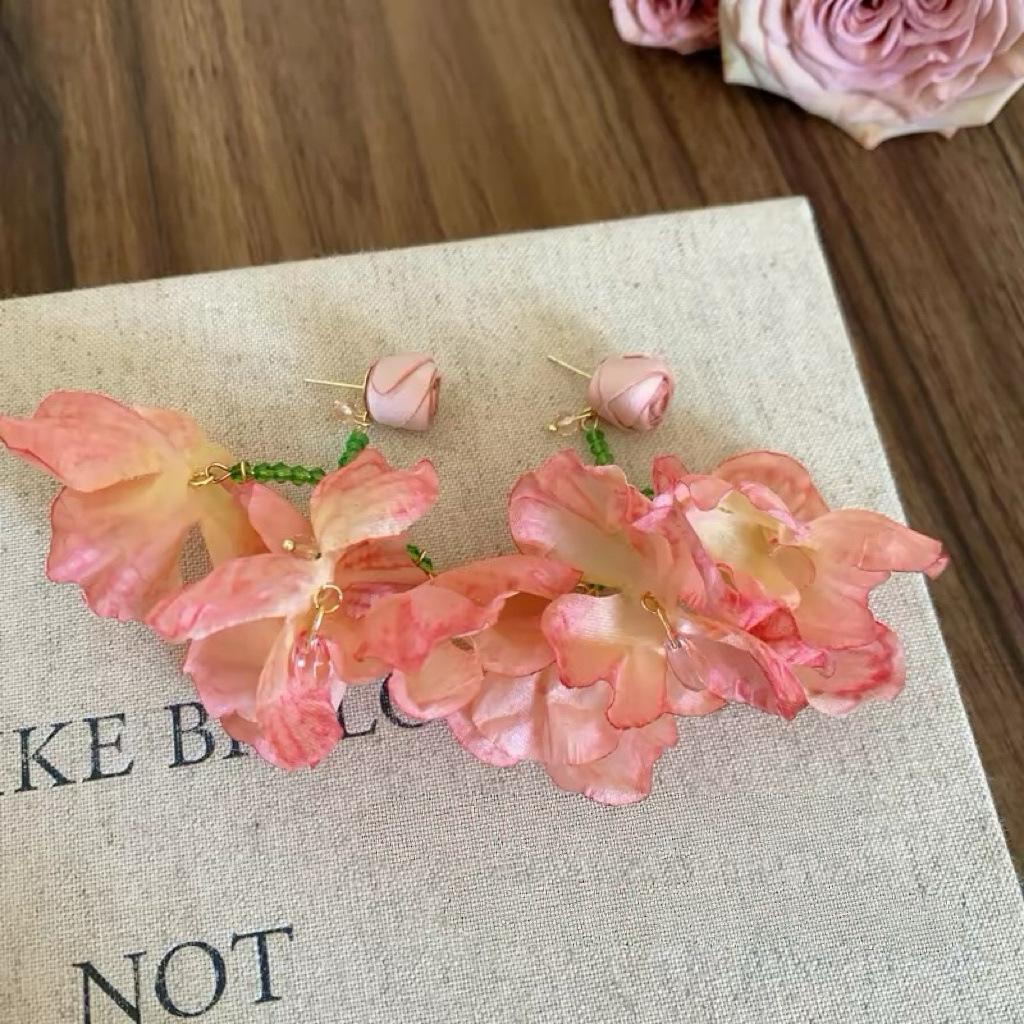 Holiday wind pink sweet flower earrings women s niche design beaded stud earrings seaside unique exaggerated earrings
Holiday wind pink sweet flower earrings women s niche design beaded stud earrings seaside unique exaggerated earrings
