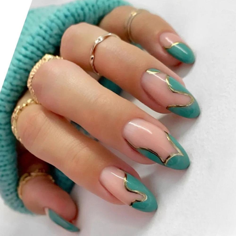 Box of 24 Almond-Shaped Green Press-On Nails with Minimalist Gold Lines and Skin-Whitening Finish.
Box of 24 Almond-Shaped Green Press-On Nails with Minimalist Gold Lines and Skin-Whitening Finish.