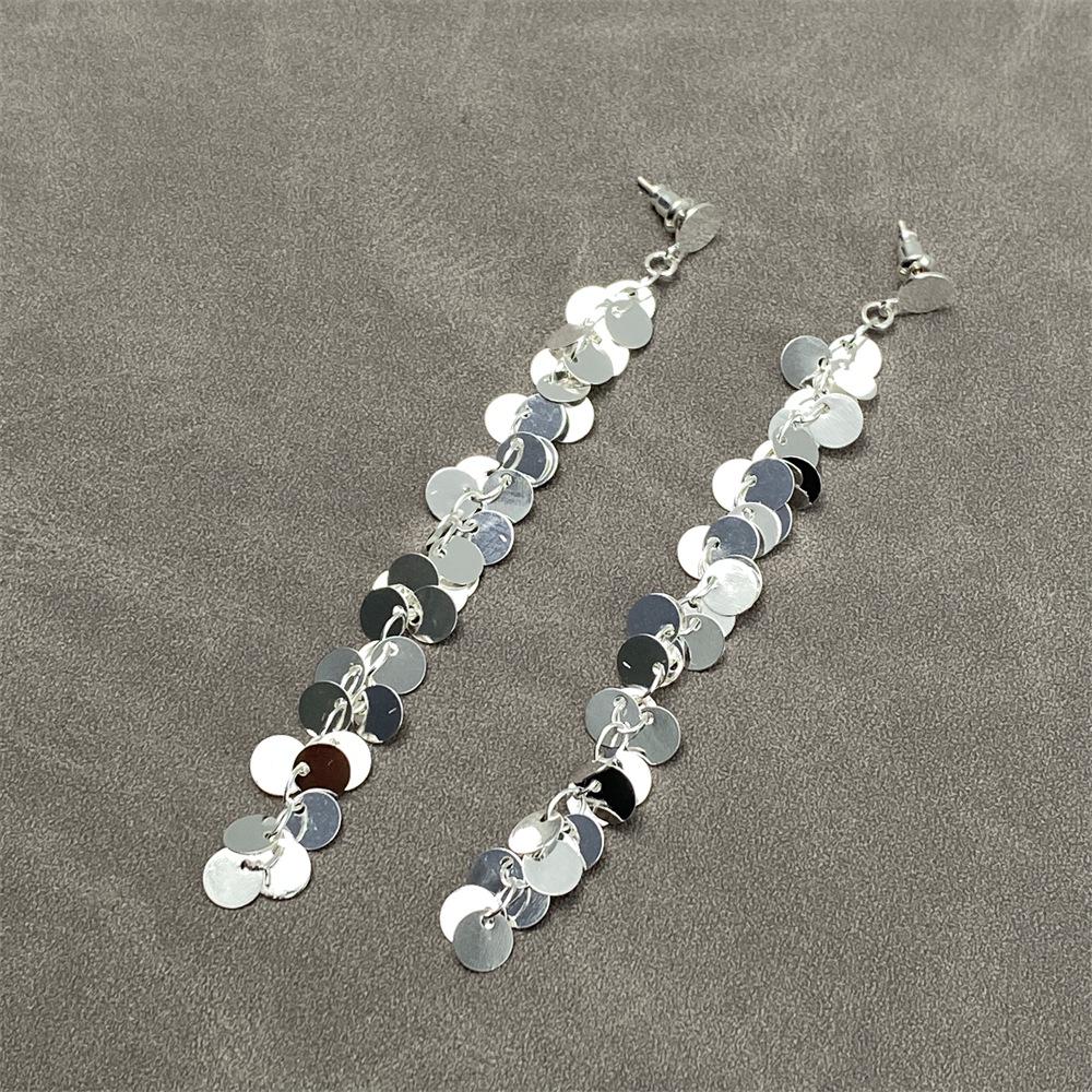 European & American Sequin Long Tassel Earrings: Chic High-End Studs with Cold Style for Women
European & American Sequin Long Tassel Earrings: Chic High-End Studs with Cold Style for Women