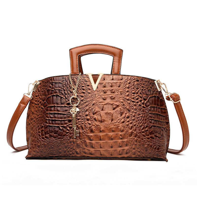 Bag women s new light luxury crocodile pattern portable Kelly bag fashion temperament generous shoulder bag
Bag women s new light luxury crocodile pattern portable Kelly bag fashion temperament generous shoulder bag