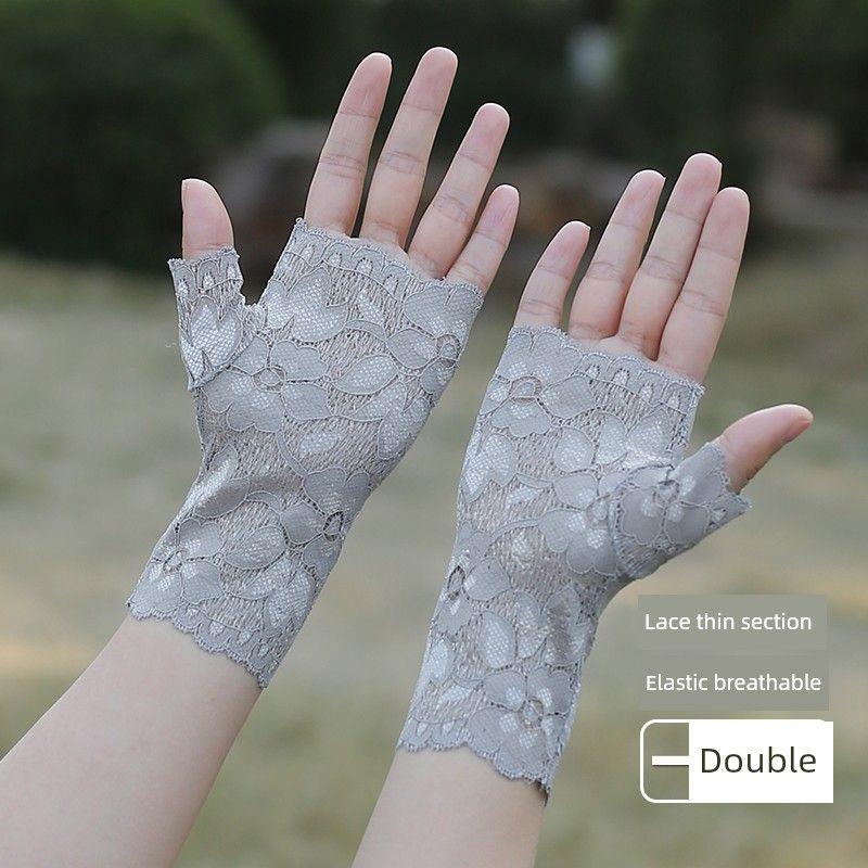 Lace Half Finger Thin Sun Protection Gloves Women Summer Ice Silk Open Finger Non-Slip Driving Half Scar Covering Lace Gloves Dark gray 16cm One size
Lace Half Finger Thin Sun Protection Gloves Women Summer Ice Silk Open Finger Non-Slip Driving Half Scar Covering Lace Gloves Dark gray 16cm One size