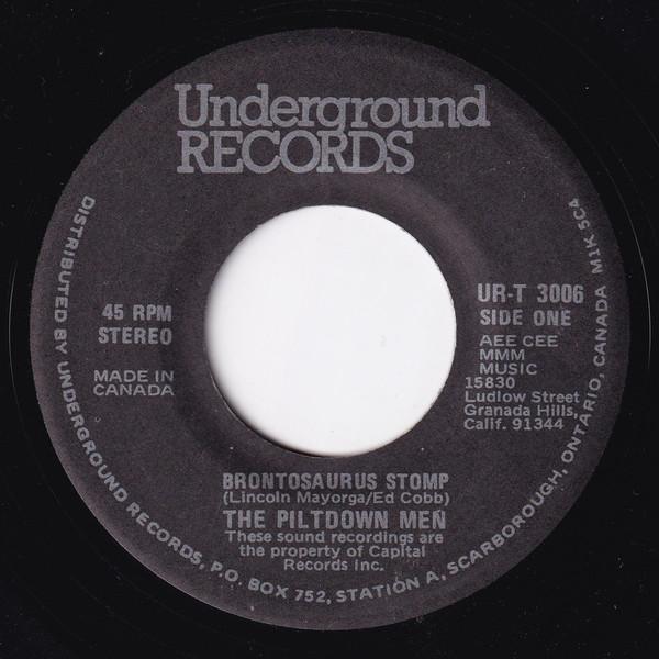 7inch Record PILTDOWN MEN Brontosaurus Stomp Piltdown Rides URT3006 UNDERGROUND Canada Rock Used
7inch Record PILTDOWN MEN Brontosaurus Stomp Piltdown Rides URT3006 UNDERGROUND Canada Rock Used