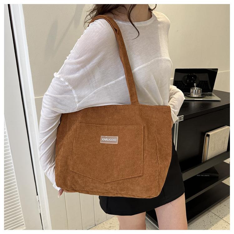 New large-capacity ins corduroy simple tote bag female Mori female students literary one-shoulder messenger bag коричневий
New large-capacity ins corduroy simple tote bag female Mori female students literary one-shoulder messenger bag коричневий