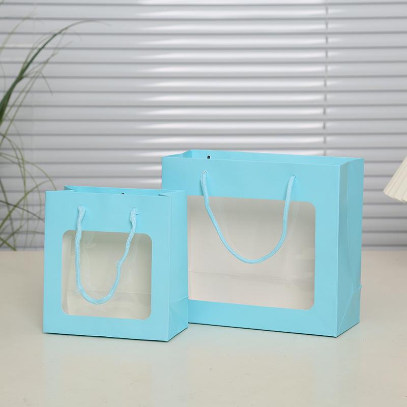 Colorful Window Display Handle Gift Bag for Clothing & Party Favors
Colorful Window Display Handle Gift Bag for Clothing & Party Favors