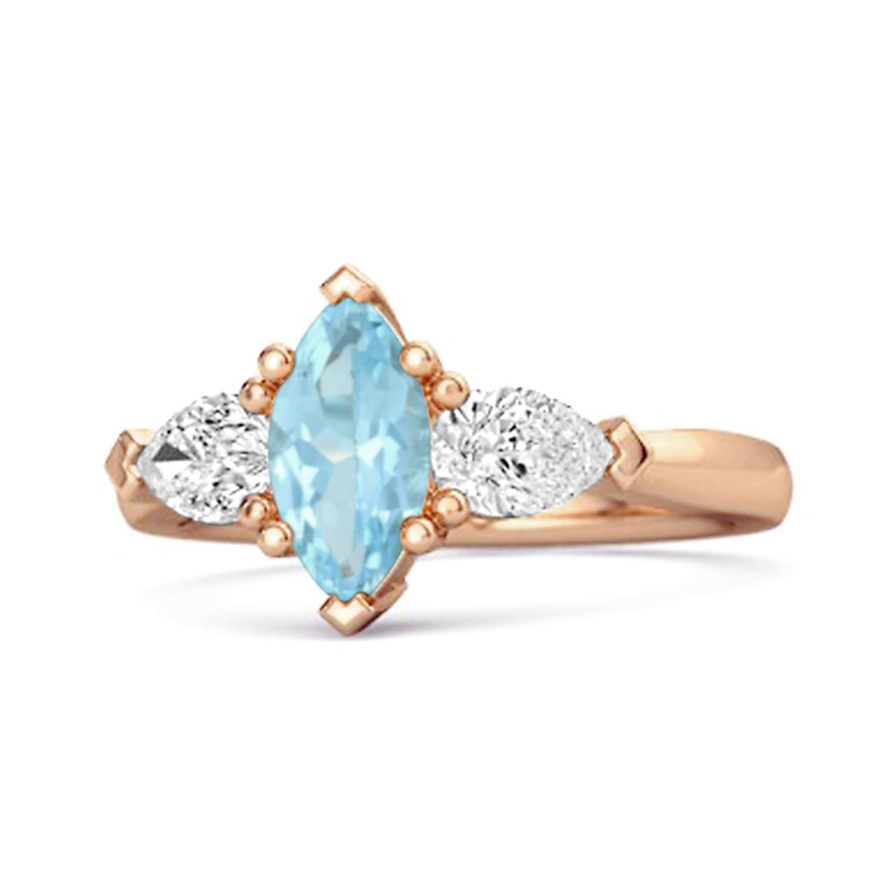 Blue Topaz Trio Stone Tapered Ring - Sterling Silver Rose Gold Vermeil 7.5 рожевий колір золота
Blue Topaz Trio Stone Tapered Ring - Sterling Silver Rose Gold Vermeil 7.5 рожевий колір золота