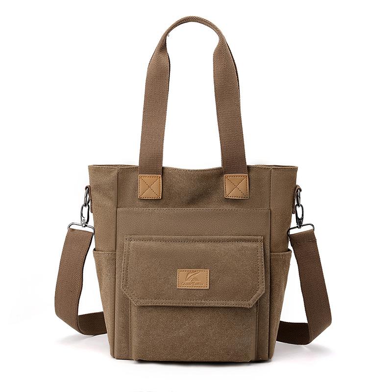 Large Capacity Casual Commuter Shoulder Bag Trendy Canvas Bag Women S Versatile Fashion Hand-Held Women S Large Bag темно-коричневого кольору
Large Capacity Casual Commuter Shoulder Bag Trendy Canvas Bag Women S Versatile Fashion Hand-Held Women S Large Bag темно-коричневого кольору