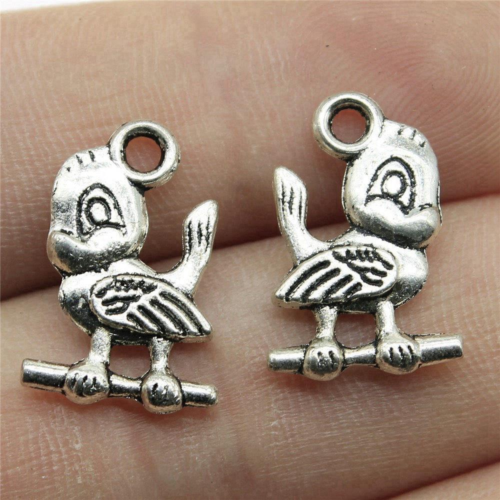 Чоловічі ювелірні вироби з підвісками «Пташки» Масивні персоналізовані товари для мистецтва A11-20pcs-19x12mm
Чоловічі ювелірні вироби з підвісками «Пташки» Масивні персоналізовані товари для мистецтва A11-20pcs-19x12mm