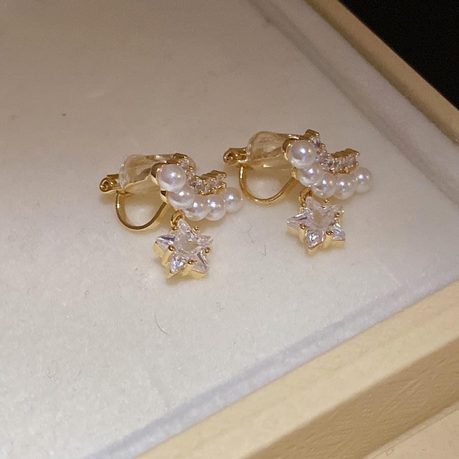 K real gold electroplated zircon pearl star pendant earclip exquisite fashion earrings light luxury high-end earrings women
K real gold electroplated zircon pearl star pendant earclip exquisite fashion earrings light luxury high-end earrings women