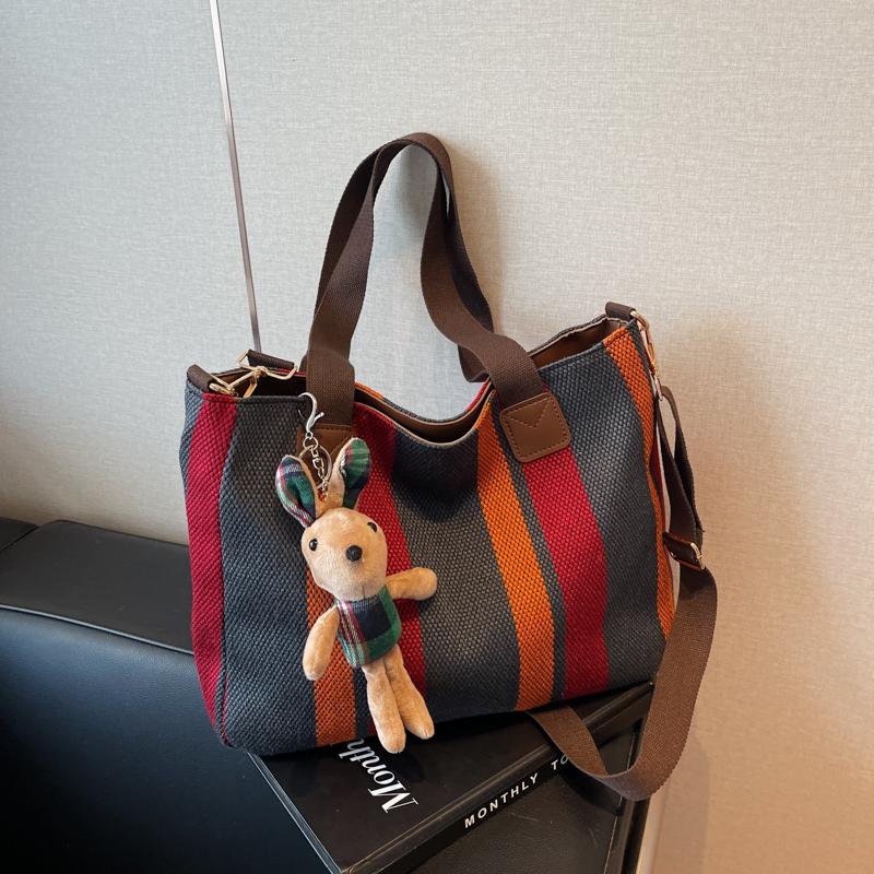 Striped Canvas Fabric Shoulder Tote Bags For Women Contrast Color Large Capacity Crossbody Messenger Shopping Bag With Pendant 37x27x12cm
Striped Canvas Fabric Shoulder Tote Bags For Women Contrast Color Large Capacity Crossbody Messenger Shopping Bag With Pendant 37x27x12cm