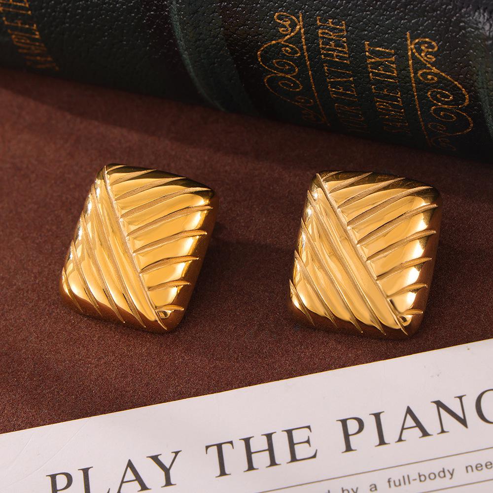 18K Gold-Plated Titanium Steel Striped Earrings - Simple European & American Style, Non-Fading Design
18K Gold-Plated Titanium Steel Striped Earrings - Simple European & American Style, Non-Fading Design