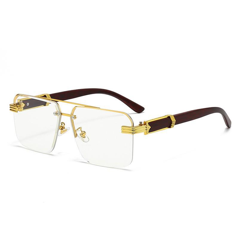 Gold Semi-Rimless Sunglasses with Trendy Square Frames & Floral Decor
Gold Semi-Rimless Sunglasses with Trendy Square Frames & Floral Decor