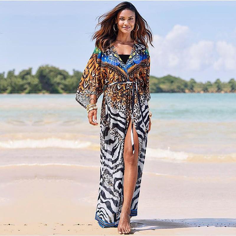 EDOLYNSA Boho Свободное длинное кимоно с принтом, повседневное платье с запахом для летних каникул, женская одежда, пляжная одежда, купальный костюм, накидка Q1467
EDOLYNSA Boho Свободное длинное кимоно с принтом, повседневное платье с запахом для летних каникул, женская одежда, пляжная одежда, купальный костюм, накидка Q1467