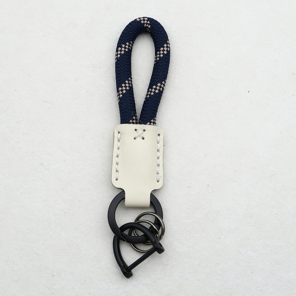 Hand-Woven Cowhide Leather Keychain Pendant with Logo Embossing - High-Quality Anti-Lost Car Lanyard
Hand-Woven Cowhide Leather Keychain Pendant with Logo Embossing - High-Quality Anti-Lost Car Lanyard