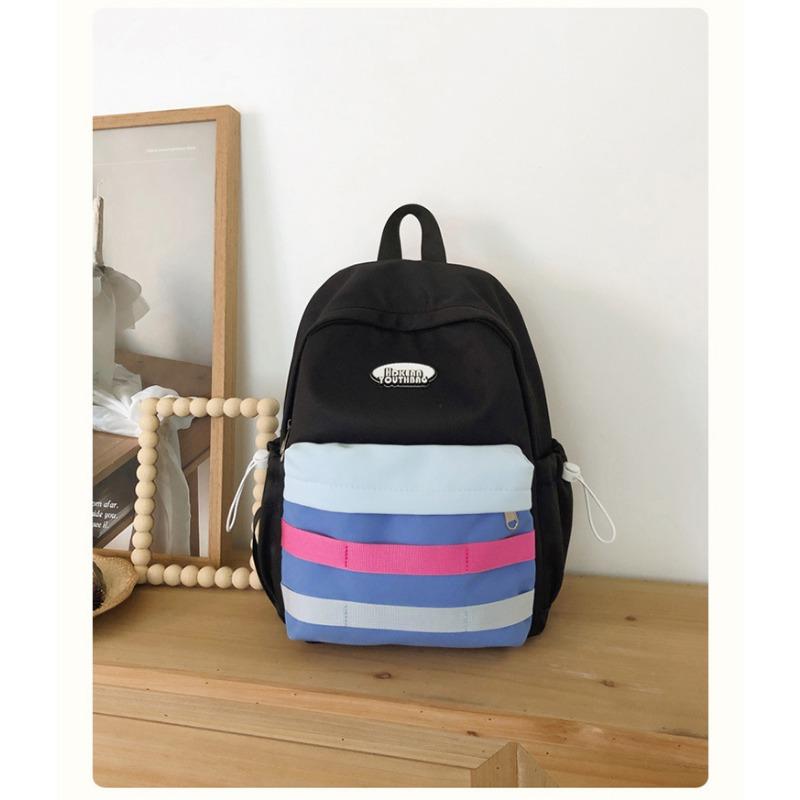 High value cartoon girl, small style and fresh contrasting color splicing backpack, junior high school student backpack
High value cartoon girl, small style and fresh contrasting color splicing backpack, junior high school student backpack