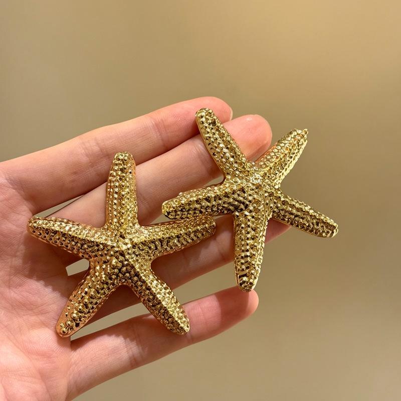 Seaside vacation wind silver needle pleated gold starfish stud earrings personalized fashion exquisite earrings light luxury high-end earrings
Seaside vacation wind silver needle pleated gold starfish stud earrings personalized fashion exquisite earrings light luxury high-end earrings